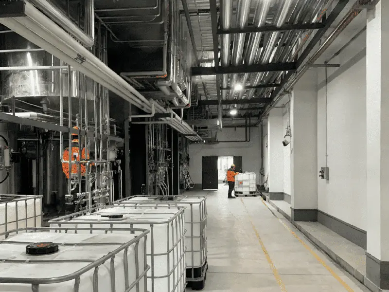 Silfluo polysilazane production line with reactor vessels and IBC filling